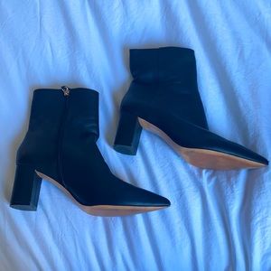 Heeled black leather boot